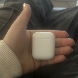Apple White Wireless Earbud Charging Case Compact Design